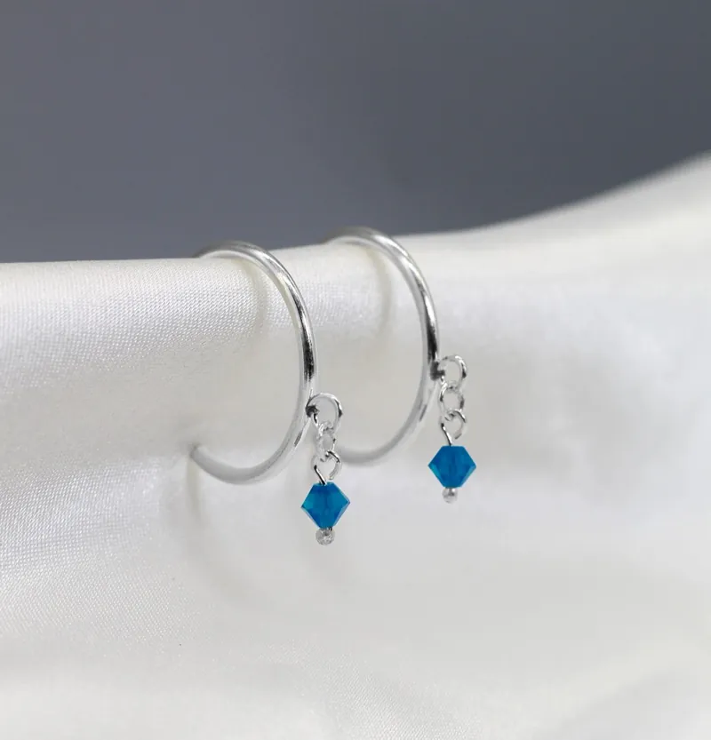 Aretes de Plata 925 con piedra azul fabricados en Perú