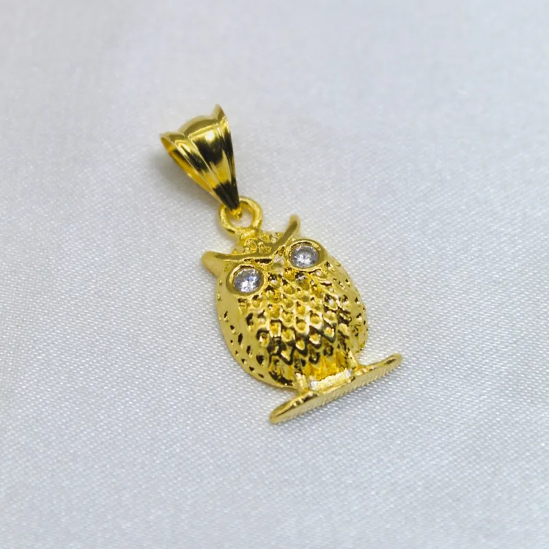 Cast Gold owl pendant
