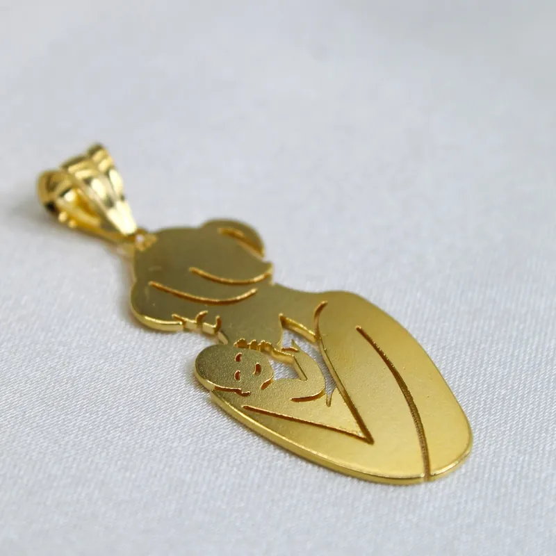 Gold pendant with laser-cut openwork design